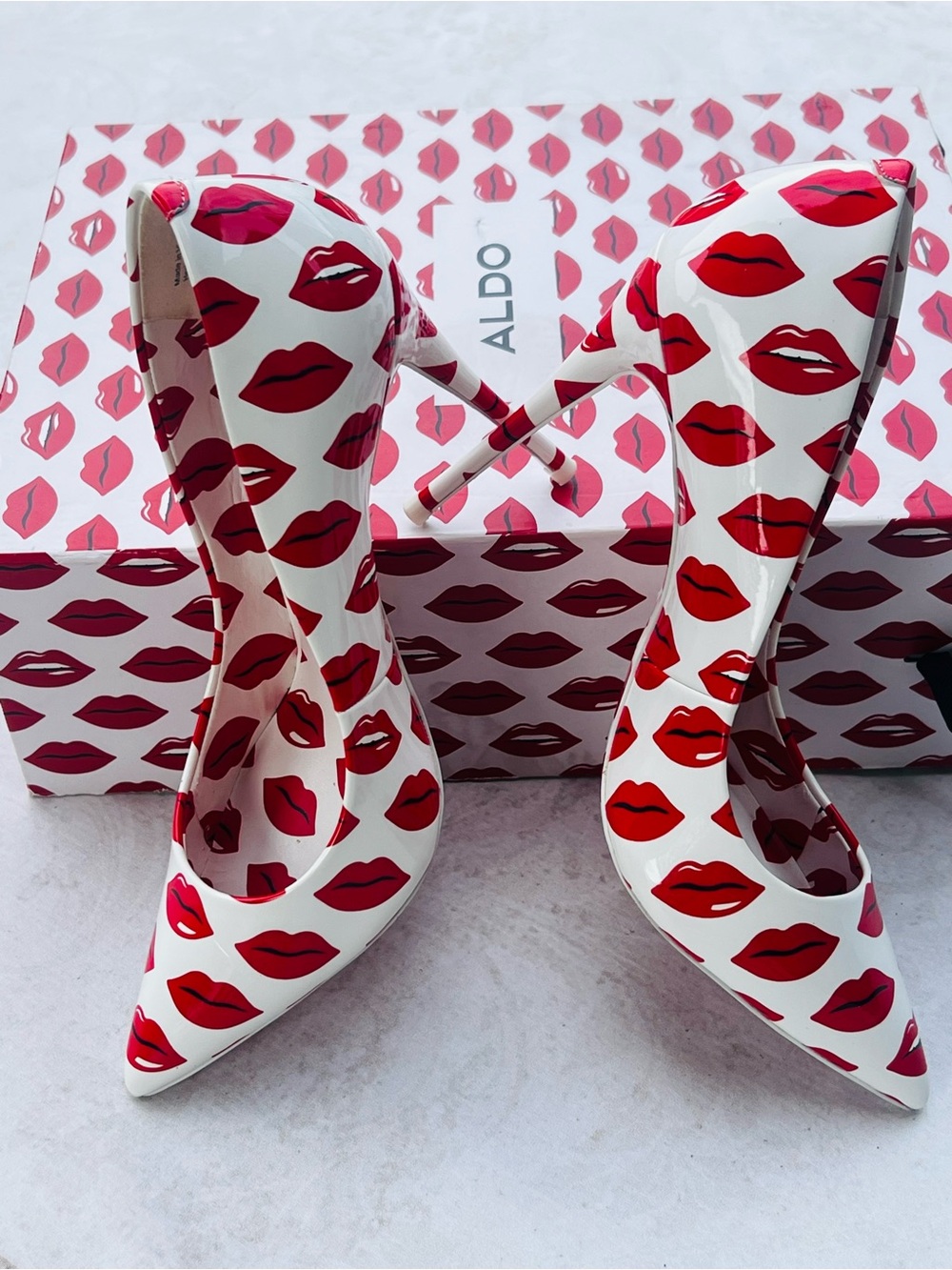Aldo White Pointed Pumps with Red Lip Print